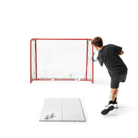 Official-size floorball goal set up outdoors for home shooting practice